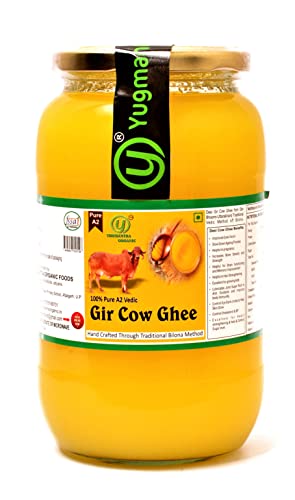 Yugmantra Organic Foods -100 % Natural Pure & Aromatic Desi Gir Cow Ghee -Traditional Churned with Bilona Method | Premium Ghee| Diet Friendly | No Added Additives | A2 Danedar Desi Ghee | Immunity Booster-1000 ml Glass Bottle
