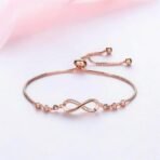 Nilu's Collection Infinity Shape Cubic Zirconia Diamond Bracelet for Women & Girls, Jewelry for Gift, Adjustable Charm Bracelet - Fast Shipping to USA & Canada - Image 7