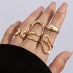 Shining Diva Fashion Set of 4 Latest Stylish Gold Plated Rings for Women and Girls (16520r) - Fast Shipping to USA & Canada - Image 3