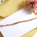 ACCESSHER Traditional Beads Rakhi with Roli Kumkum & Card - Fast Shipping to USA & Canada - Image 3