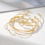 Shining Diva Fashion Set of 4 Latest Stylish Multilayer Gold Plated Bangle Bracelet for Women and Girls (16623b) - Fast Shipping to USA & Canada - Image 5