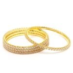 Karatcart Set of 4 Gold Plated American Diamond Studded Bangles for Women - Fast Shipping to USA & Canada