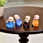 Xtore 4 blissfull Meditating Monk for Home/Office/car DECOR | Wisdom Monks Figurine Set| Resin Decorative Statue | Zen Philosophy Decor - (Pack of 4) - Fast Shipping to USA & Canada - Image 3