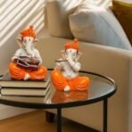 Xtore Musical Ganesha Pair for Home Decor Handicraft Resin| Brings Prosperity - (Orange and White, Pack of 2)(Resin) - Fast Shipping to USA & Canada - Image 2