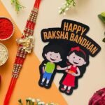 Webelkart Antique Ganesha Designer Rakhi for Brother with Fridge Magnet for Home Gift for Bhaiya Bhabhi, Raksha Bandhan Combo Pack, Rakhi for Brother/Sister Greeting Card and Roli Chawal - Fast Shipping to USA & Canada