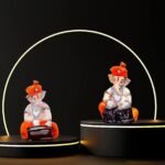 Xtore Musical Ganesha 2 Statues for Home Decor (Orange and White, Pack of 2),(Handicraft Resin) - Fast Shipping to USA & Canada
