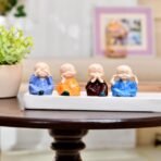 Xtore 4 blissfull Meditating Monk for Home/Office/car DECOR | Wisdom Monks Figurine Set| Resin Decorative Statue | Zen Philosophy Decor - (Pack of 4) - Fast Shipping to USA & Canada