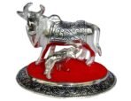 JaipurCrafts Kamdhenu Cow and Calf Showpiece - 10.16 cm (Aluminium, Silver, Red) - Fast Shipping to USA & Canada