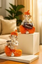 Xtore Musical Ganesha Pair for Home Decor Handicraft Resin| Brings Prosperity - (Orange and White, Pack of 2)(Resin) - Fast Shipping to USA & Canada