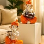 Xtore Musical Ganesha Pair for Home Decor Handicraft Resin| Brings Prosperity - (Orange and White, Pack of 2)(Resin) - Fast Shipping to USA & Canada
