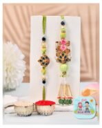 CraftVatika Designer Rakhi Set for Brother Bhaiya Bhabhi | Peacock Rakhi for Bhaiya Bhabhi Raksha Bandhan Couple Set of 2 with Fridge Magnet Gift, Rakshabandhan Greeting Card, Tilak Set,Home Decor - Fast Shipping to USA & Canada