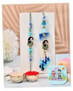 CraftVatika Evil Eye Peacock Rakhi Set for Brother and Bhabhi, Designer Rakhi set for Bhaiya Bhabhi Bro Sister, Lumba for Bhabhi, with Fridge Magnet Gift, Best wishes Greeting Card, Tilak - Fast Shipping to USA & Canada
