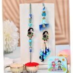 CraftVatika Evil Eye Peacock Rakhi Set for Brother and Bhabhi, Designer Rakhi set for Bhaiya Bhabhi Bro Sister, Lumba for Bhabhi, with Fridge Magnet Gift, Best wishes Greeting Card, Tilak - Fast Shipping to USA & Canada